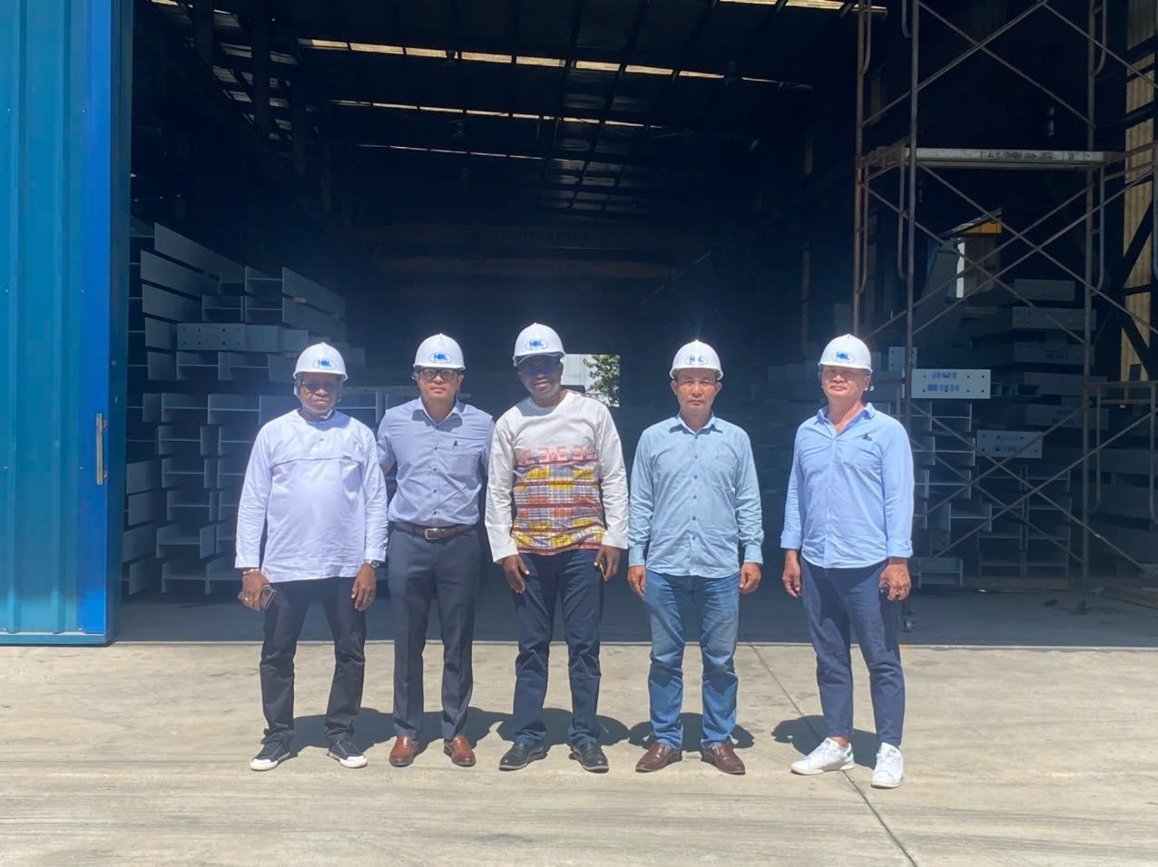 Showing visitors around the fabrication workshop
